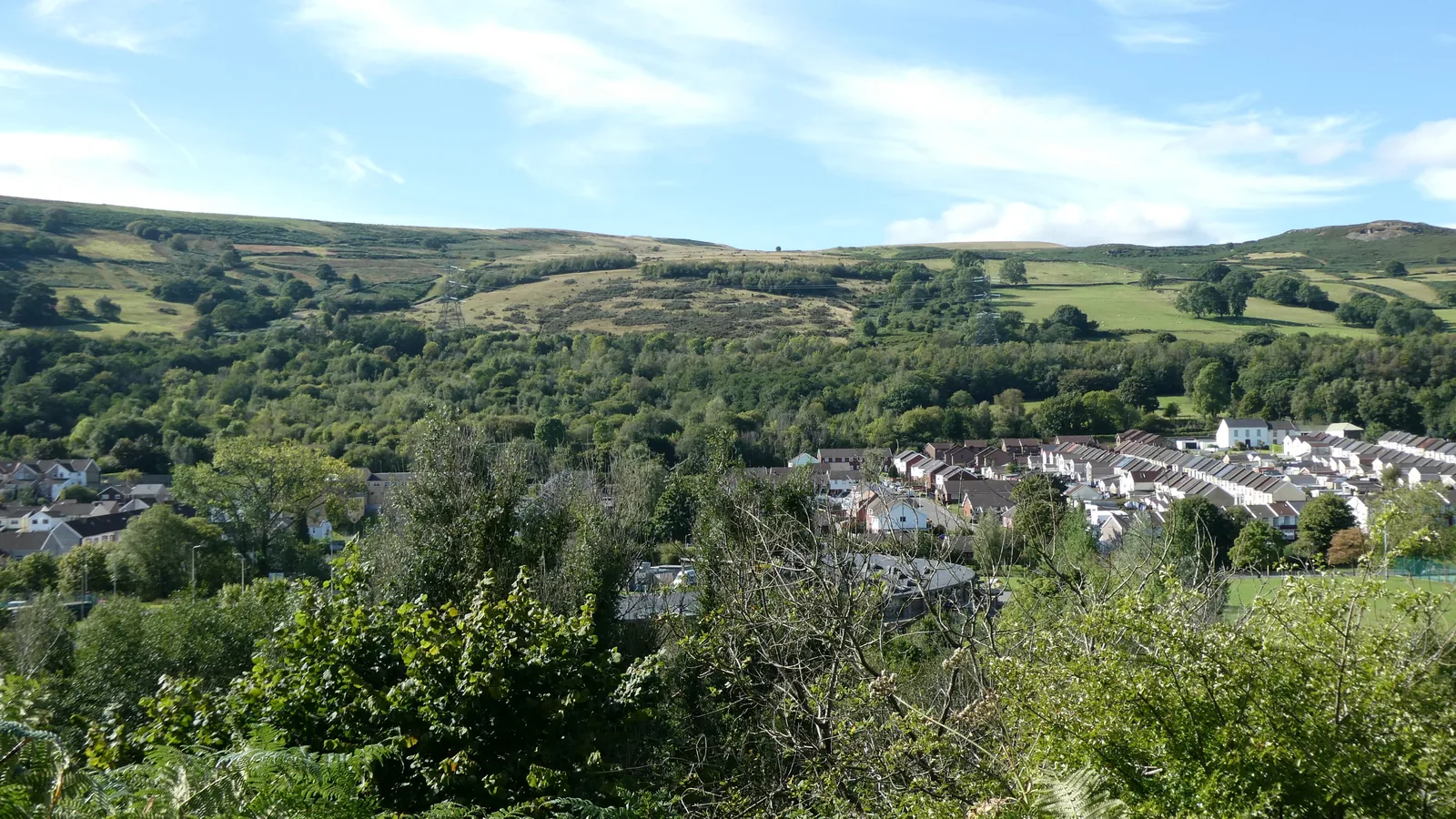 View across the wooded Taff valley toward the village of Aberfan in South Wales