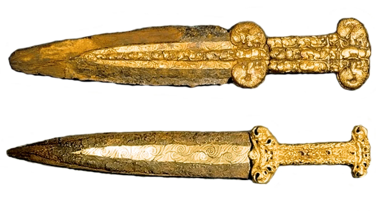 Two iron daggers with worn handles, laid side by side against a plain background