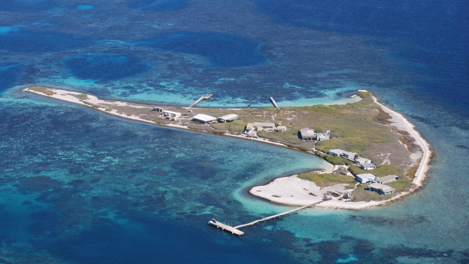 Low flat coral island in the Wallabi Group of the Houtman Abrolhos, seen from the air