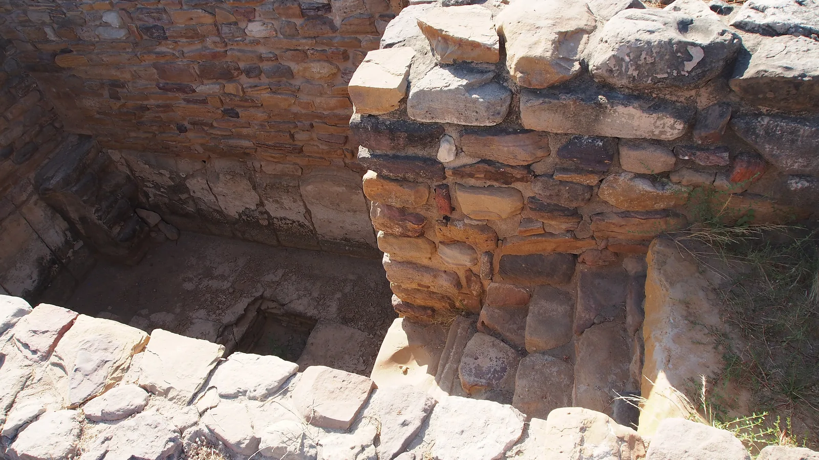 Stepped stone reservoir tanks inside the walled citadel of Dholavira