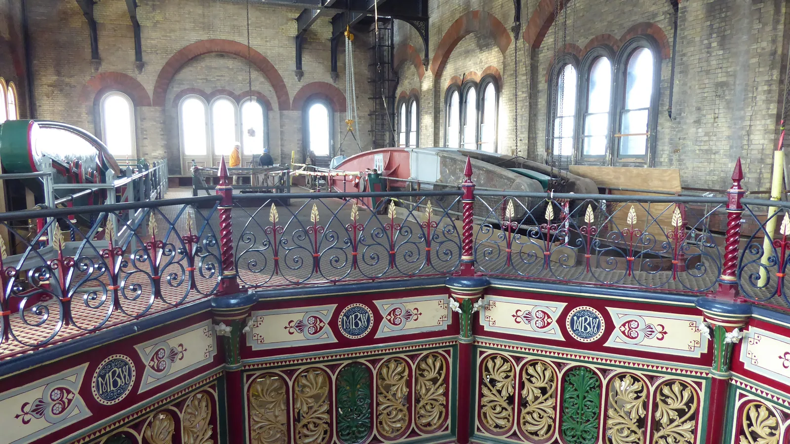 Ornate cast-iron beam engines inside the Crossness pumping station engine house