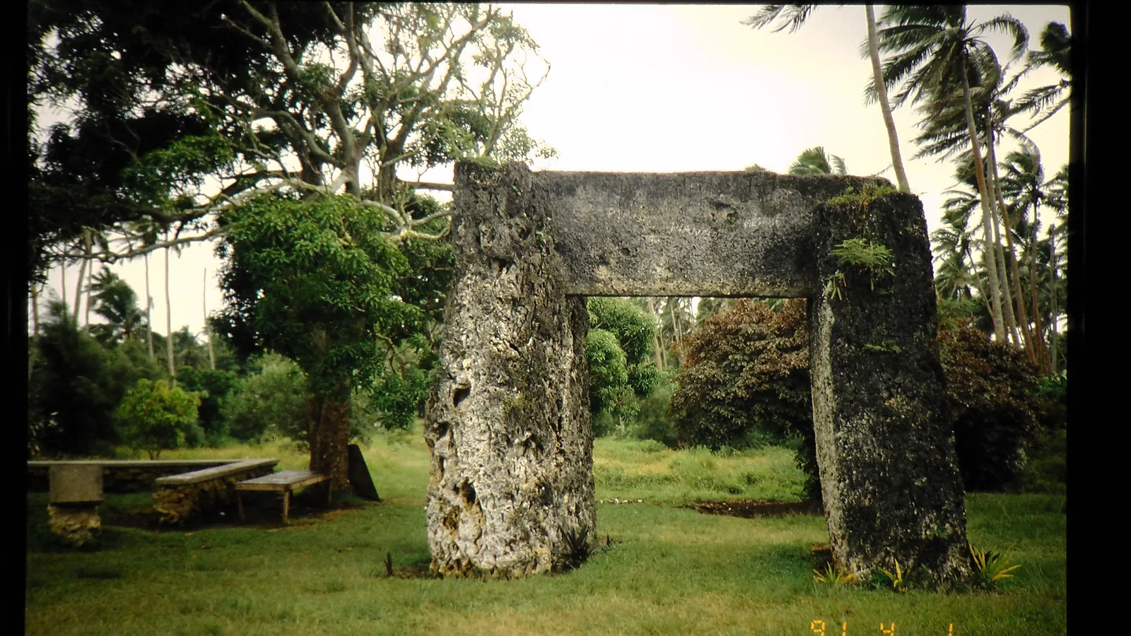 Three large coral-stone slabs forming a trilithon gateway at Heketa, Tonga
