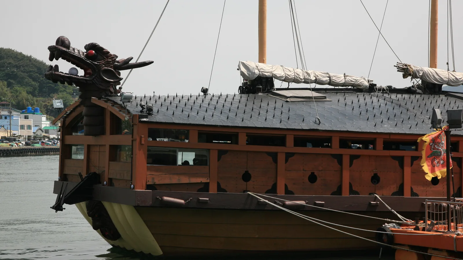 Turtle ship replica with dragon head prow moored at Tongyeong port