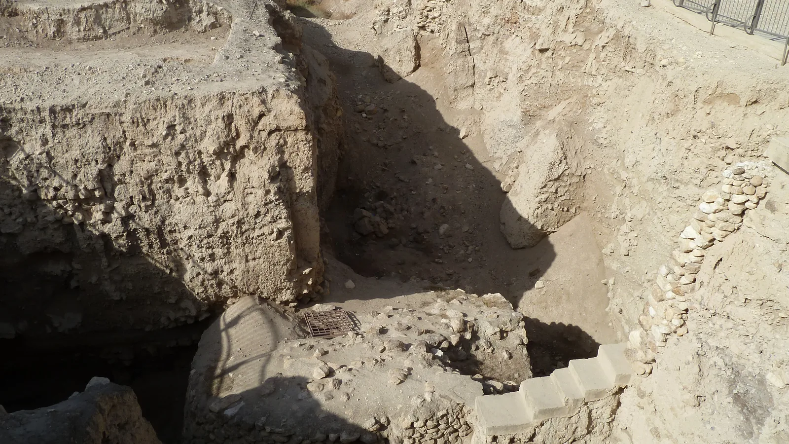 Close view of the stone courses of the Neolithic tower at Tell es-Sultan