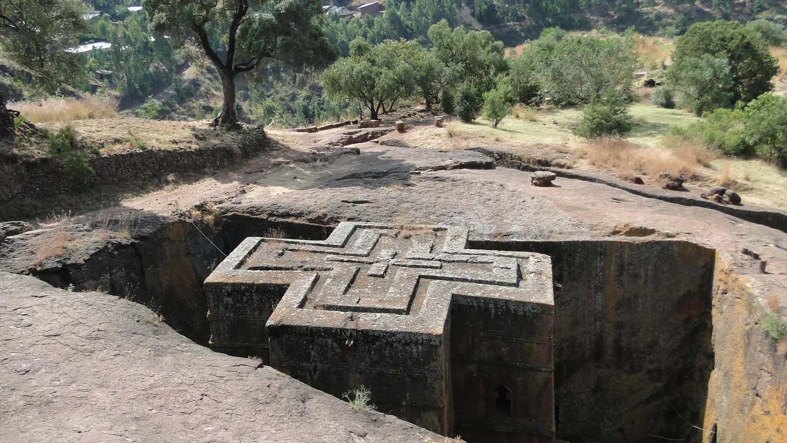 The cross-shaped roof of the Bete Giyorgis church carved down into the rock at Lalibela