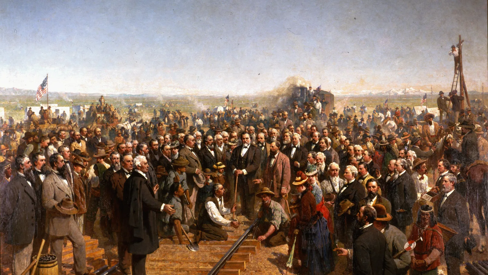 A large oil painting of a crowd in frock coats gathered around a rail between two locomotives on an open plain